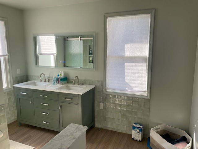 Finished bathroom vanity and tile backsplash