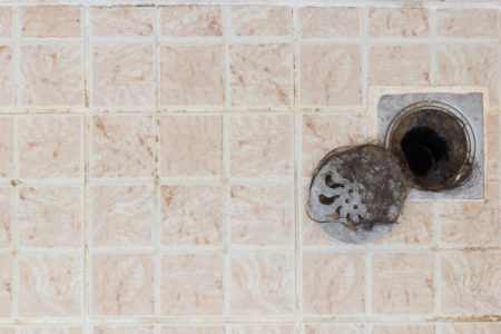 What Causes a Clogged Shower Drain